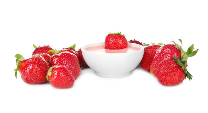 Fresh homemade yogurt with strawberries on white background