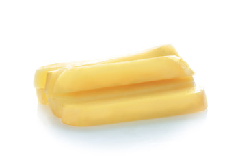 Organic raw potato strips on white background