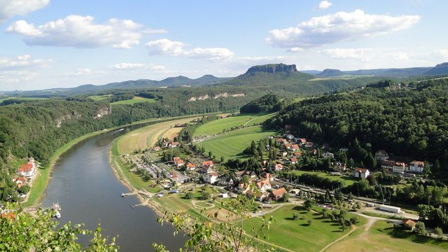 Large wide river in the background of a mountain