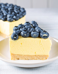 Creamy cheesecake with blueberry, vertical, selective focus
