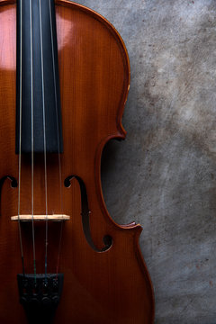 Violin on wooden dark background