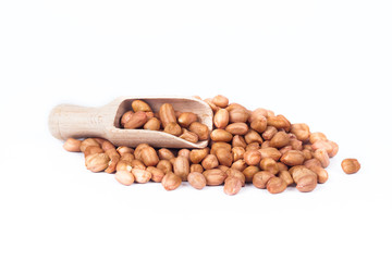 ground nut or peanut with wood spoon on white background..