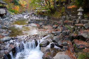 Naklejka premium Takaragawa onsen hot spring with colorful trees in autumn, Japan