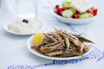 Fried anchovies, gavros in greek taverna