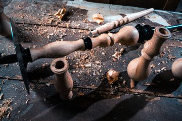 Obraz premium Wooden fragment ornament for shisha decoration on a wooden background.