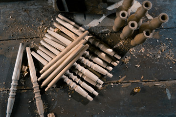Wooden fragment ornament for shisha decoration on a wooden background.