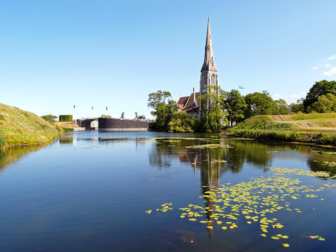 Reflections of St. Alban's Church on the Pond of the Kastellet(Citadel) in Copenhagen, Denmark