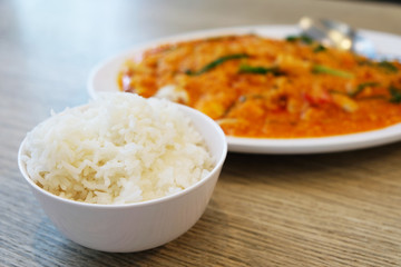 Rice and fried crab in yellow curry