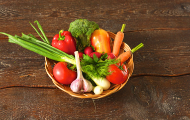 Fresh vegetables on a wooden table. Healthy food. Diet