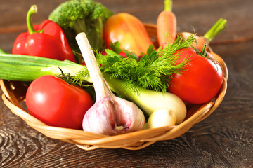 Fresh vegetables on a wooden table. Healthy food. Diet