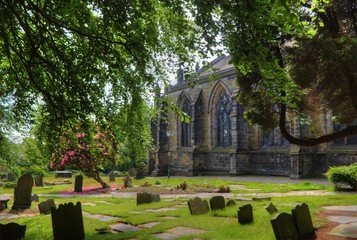 Obraz premium Graveyard and Church in Spring