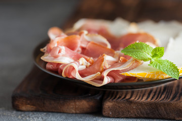 Spanish tapas with slices jamon serrano