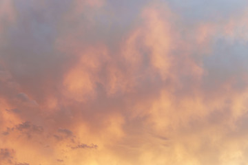 view on the beautiful orange sunset sky with clouds.