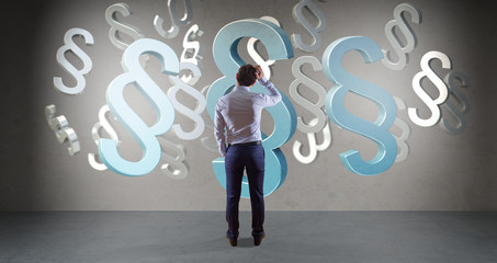 Businessman using law interface on a wall 3D rendering