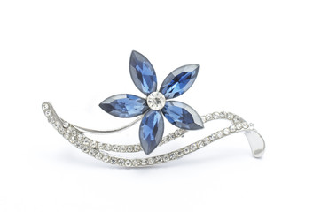 Silver flower brooch isolated on white