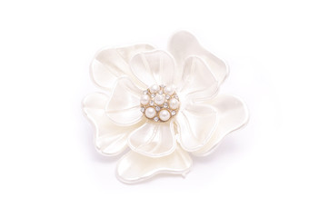 Brooch flower with pearls isolated on white