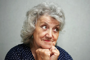 Emotional elderly woman face