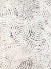 Circle pattern on the concrete floor.