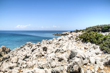 Fototapeta na wymiar Coast with the turquoise water of the Adriatic sea on Cres island in Croatia 