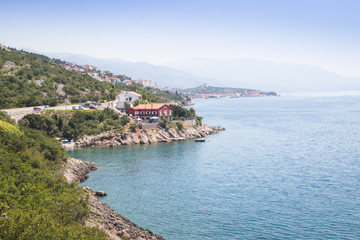 Fototapeta na wymiar Coast with the turquoise water of the Adriatic sea on Cres island in Croatia 