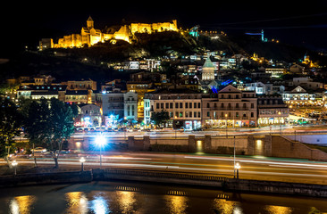 Fototapeta na wymiar Night view of Narikala fortress and the old town of Tbilisi over river Kura, Georgia