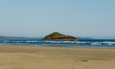 Island on the beach with clear blue sky
