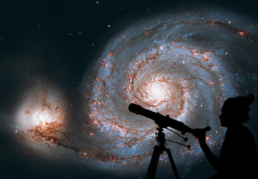 Girl looking at the stars with telescope. Whirlpool Galaxy. Spiral galaxy M51 or NGC 5194.Elements of this image are furnished by NASA.