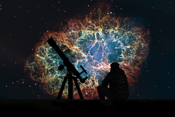 Man with telescope looking at the stars. Crab Nebula in constellation Taurus. Supernova Core pulsar...