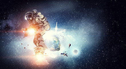 Spaceman on flying board. Mixed media