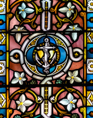 Stained Glass close up H in Church of the Holy Cross
