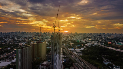 Building under construction with cityscape background