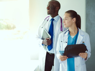 Doctors analyzing an x-ray in a meting. Doctors