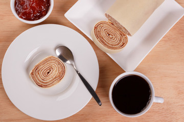 Swiss roll (cake) with red berry jam