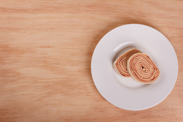 Swiss roll (cake) with red berry jam