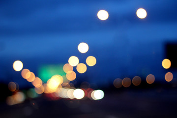 Night city street lights bokeh background.