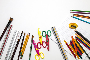Elementary school supplies stationery on white background