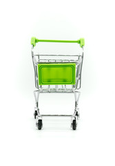 Green miniature shopping cart isolated on white