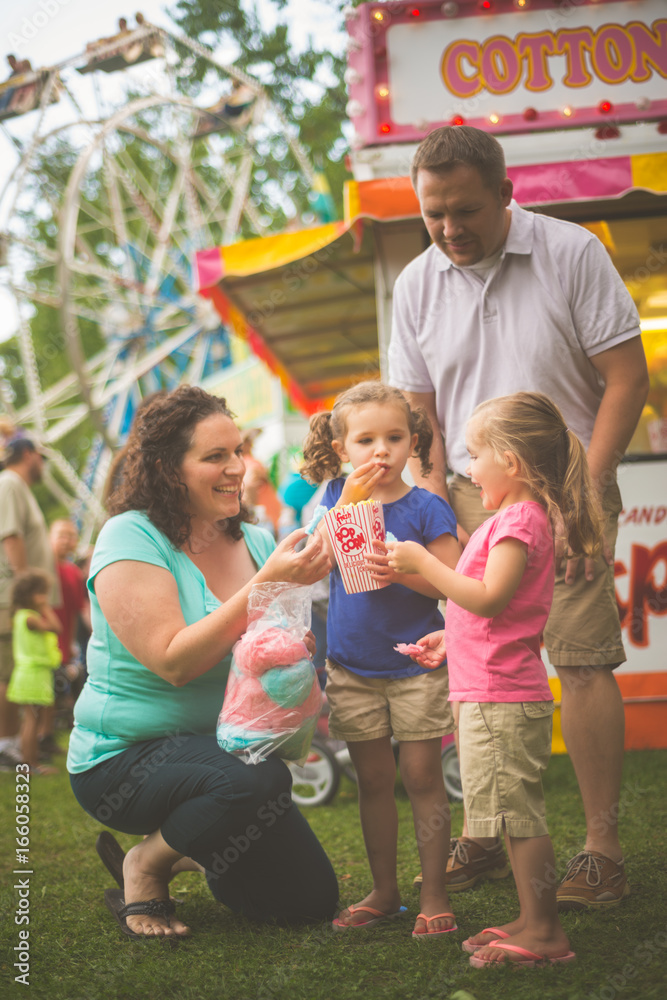 Wall mural Family at fair