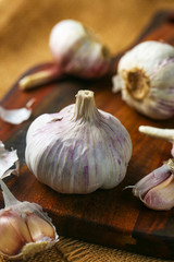 Garlic on vintage wooden board