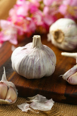 Garlic on vintage wooden board