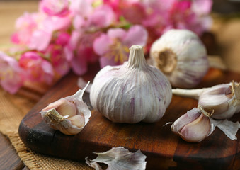 Garlic on vintage wooden board