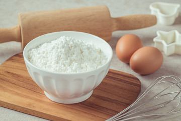 Flour in bowl and eggs