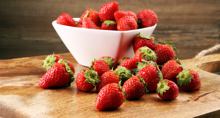 Fresh strawberry. Loosely laid strawberries in different positions.