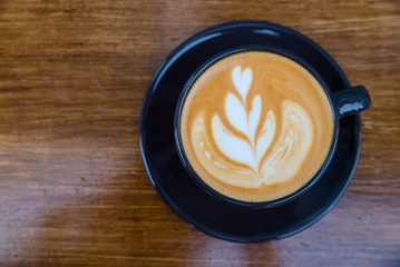Cappuccino in a cup on the table
