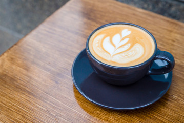 Cappuccino in a cup on the table