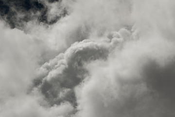 Cloudscape - white clouds making abstract shapes in the sky