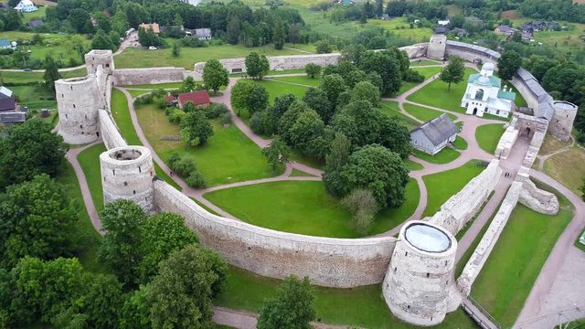 Ancient fortress Izborsk. Drone flight over old medieval stronghold in Izborsk.