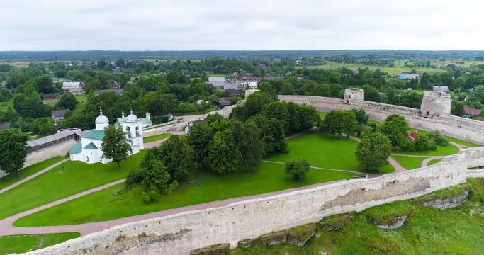 Ancient fortress Izborsk. Drone flight over old medieval stronghold in Izborsk.
