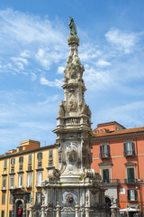 Fototapeta na wymiar Guglia Dell Immacolata obelisk at the Piazza Del Gesu, Naples