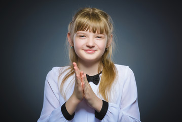 girl cunning, studio photo isolated on a gray background